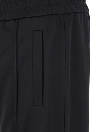 PALM ANGELS Back curved logo track pants